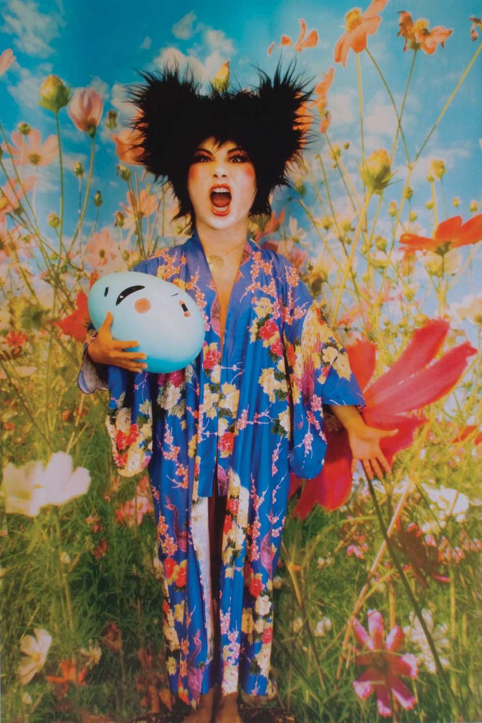 painting of woman in kimono holding egg