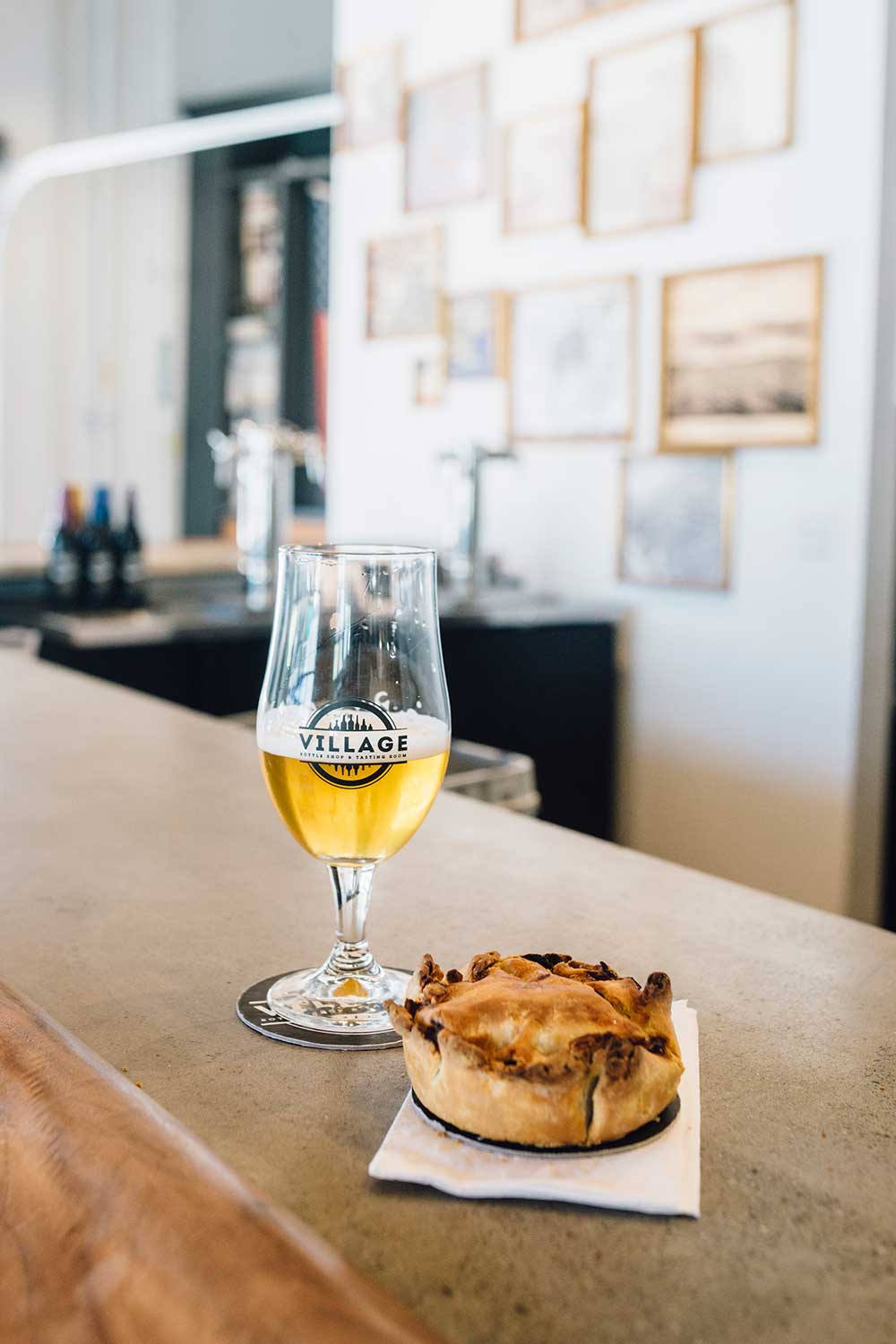 Pair your pint with house made savory pot pies at Village Bottle Shop and Tasting Room in Kaka‘ako.