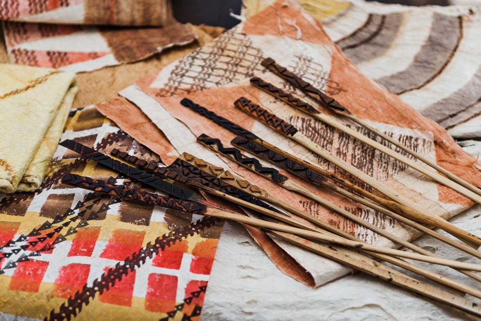 Kapa cloth and the various tools used for the designs.