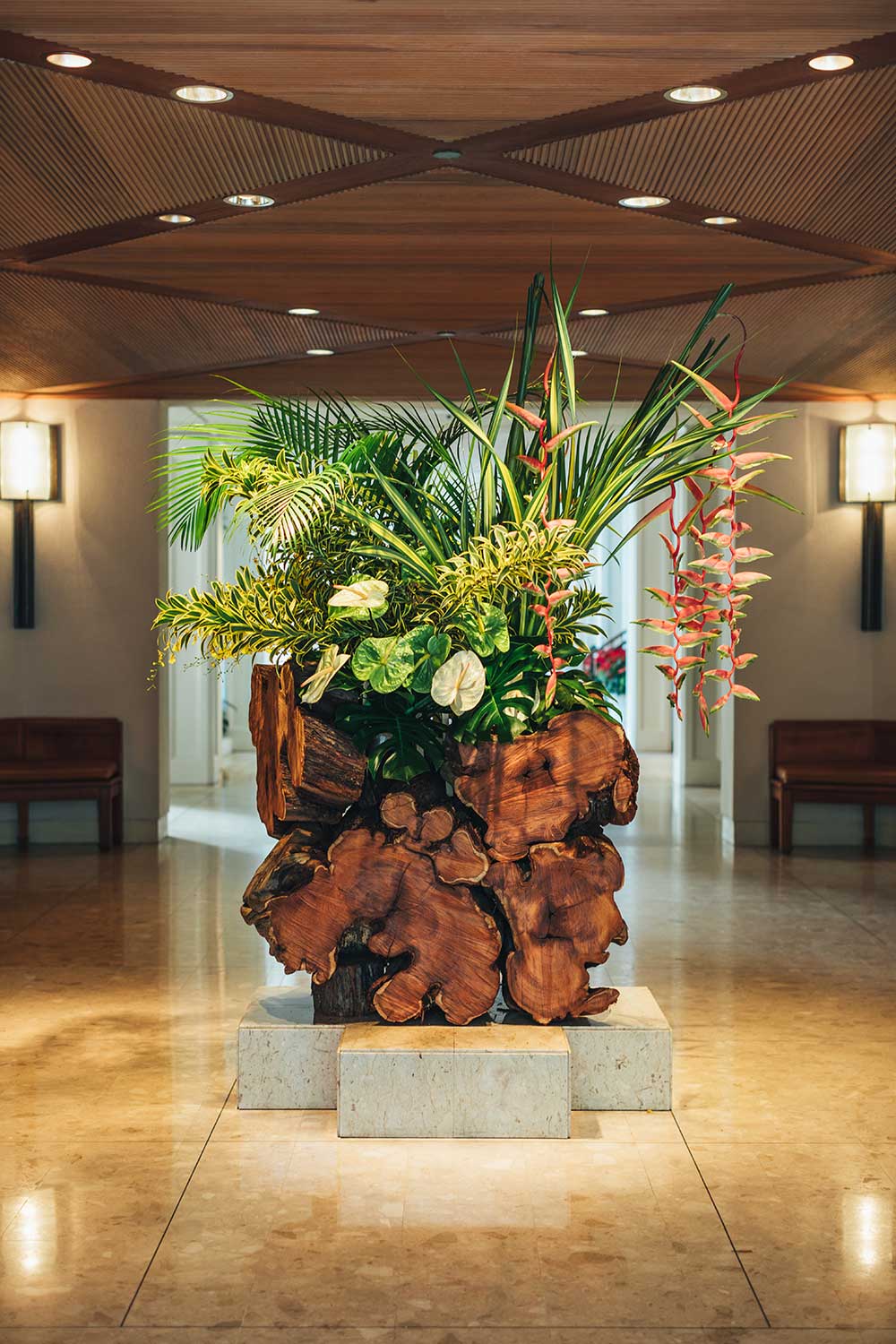 The finished kiawe sculpture greets guests upon their arrival in the Halekulani lobby. It symbolizes balance, serenity, and the natural world.